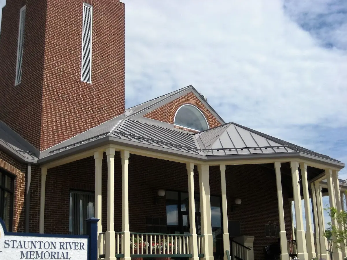 Skilled roofing craftsmen working on a residential roof in Breadysville